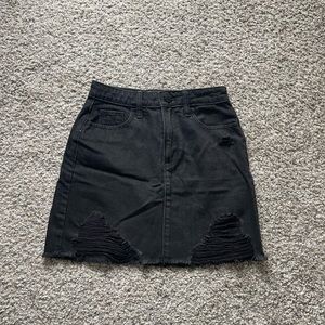 black denim distressed skirt